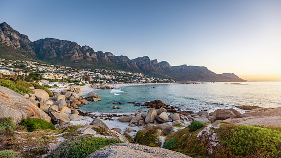 Beautiful Camps Bay Panorama, Scenic view close at sunset. Camps Bay, a beautiful suburb of the City of Cape Town with white sandy beaches underneath the Table Mountain. Cape Town, South Africa