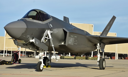 Yuma, USA - March 9, 2018: A U.S. Air Force F-35 Joint Strike Fighter (Lightning II) jet parked on the runway at Davis Monthan Air Force Base. This F-35 is assigned to Luke Air Force Base.