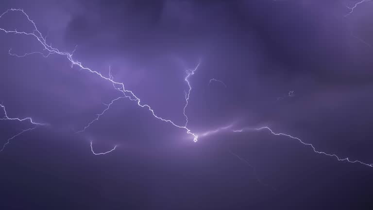 Real flashes of lightning over the sea during a powerful thunderstorm