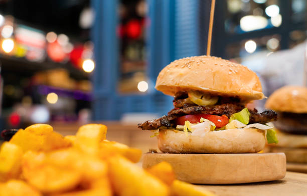 istock Hamburger with French fries chips 1140450582