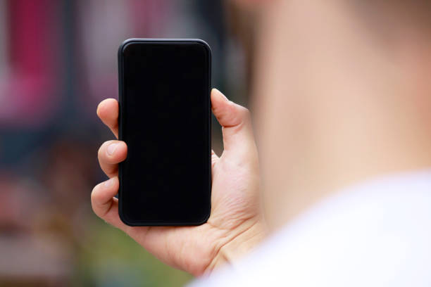 istock Man with smart phone on hand, blurred background. 1140450706