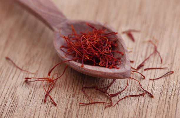 istock Saffron in a wooden scoop 1140451243