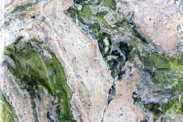 istock Green and white patterned real natural marble stone texture background for product design 1140451271