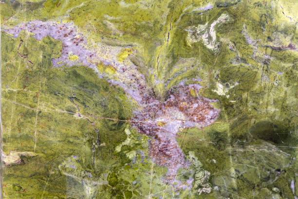 istock Green and white patterned real natural marble stone texture background for product design 1140453881