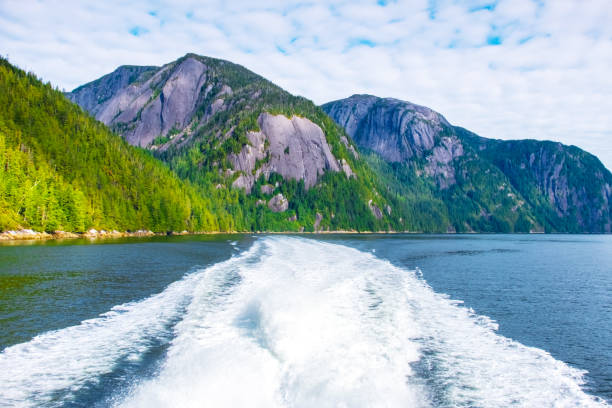 istock Wake from Stern of Ship and Mountain Scenery 1140455043