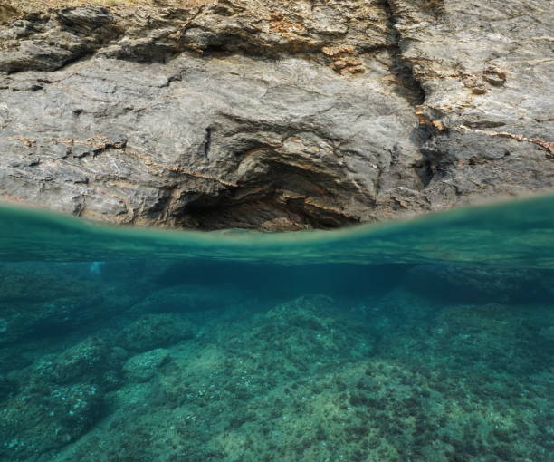 istock Over underwater rocky seashore cavern entrance 1140455559