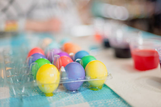 istock Closeup of bright and colorful Easter eggs drying in carton 1140460161