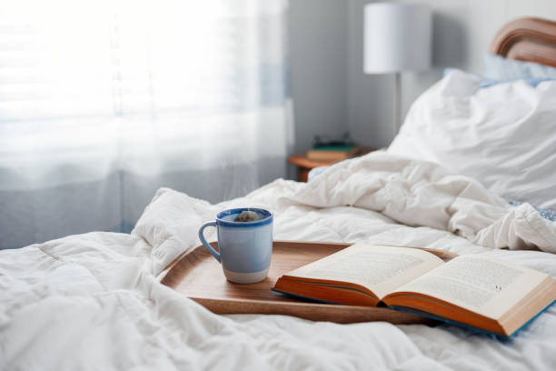 istock Relaxing at home with tea and a good book 1140460251