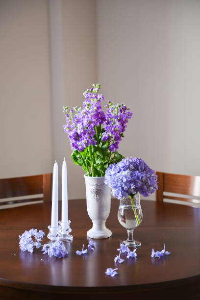 floral arrangement for interior decoration, table setting for a wedding or to create a home cosiness. use as background. lilac hydrangea