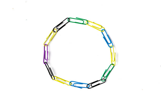 istock colorful paper clips chain in form of snake on the table surface 1140464335