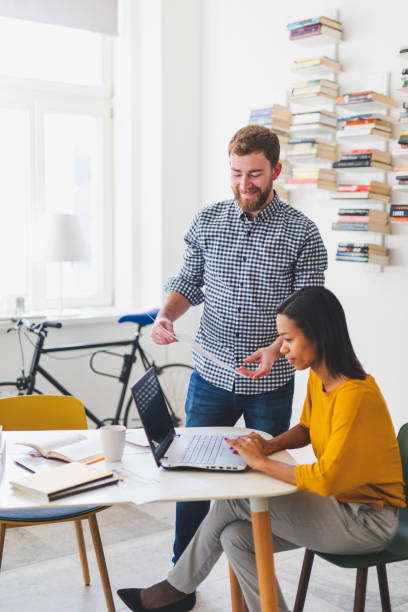 istock Two young entrepreneurs in the office 1140466356