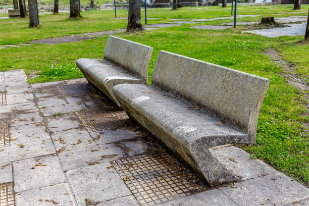 istock Stone Benches In a Public Park 1140466484