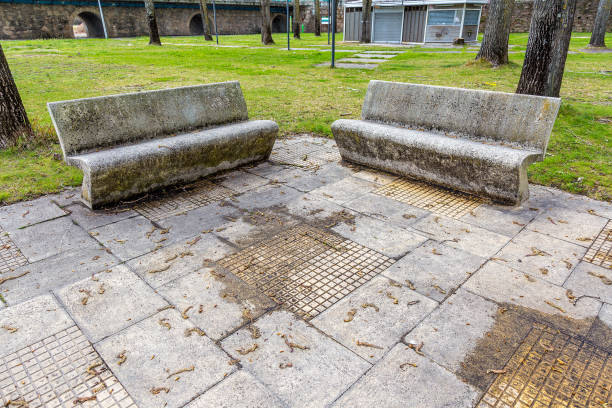 istock Stone Benches In a Public Park 1140466490