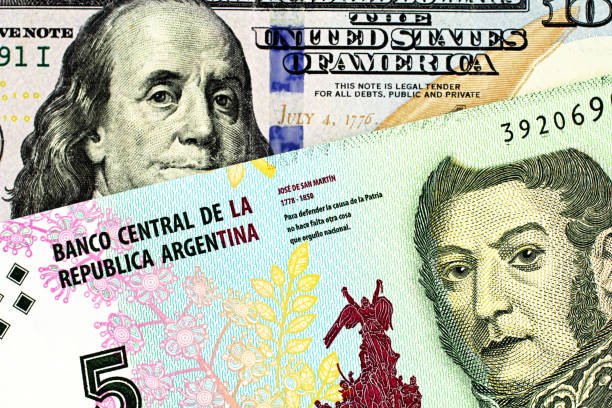 istock A five peso bank note from Argentina with an American one hundred dollar bill 1140468281