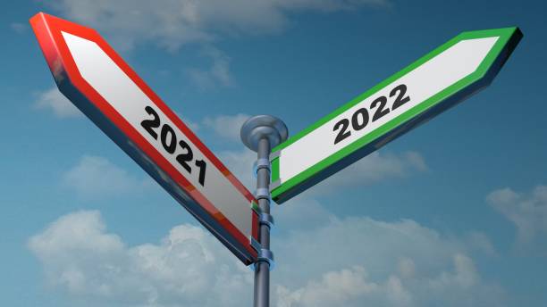2021 - 2022 red and green arrow street signs pointing to left and right - 3D rendering illustration stock photo