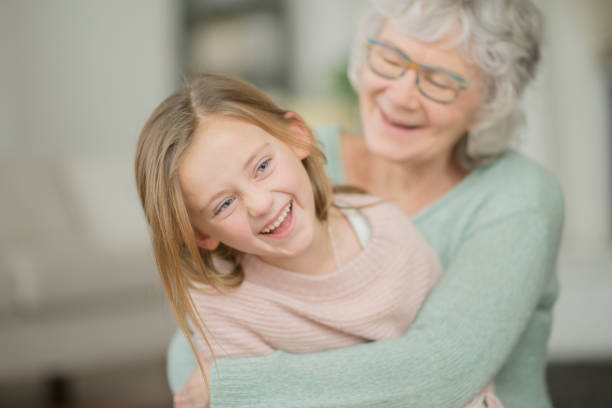 istock Grandma And Granddaughter Laughing 1140471431