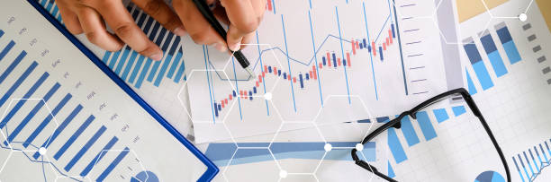 istock Close up businessman using calculator on documents Unrecognizable finance  use calculate about cost at office 1140471795