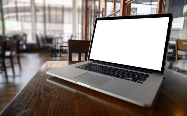 istock Mockup image of business Laptop with blank screen on table blank copy space screen for your advertising text message 1140471823