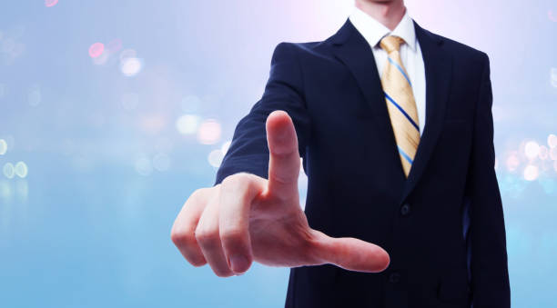 istock Businessman pointing to something 1140471932