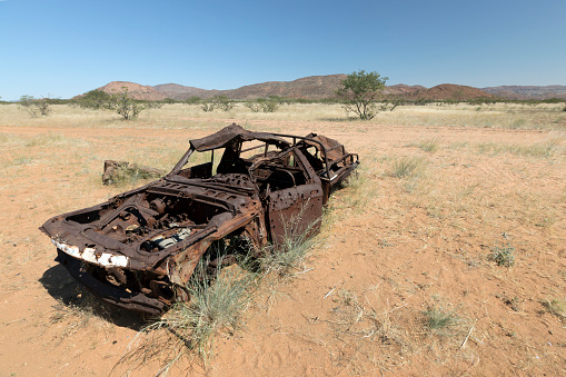 Rusted car in the Marienfluss valley, Namibia.