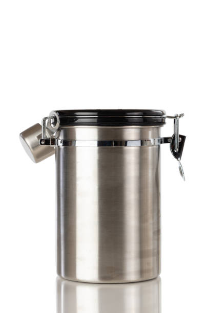 istock Stainless steel coffee ground container and scooper isolated on white background 1140477723