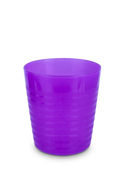 istock Purple plastic glass isolated on white background 1140482778