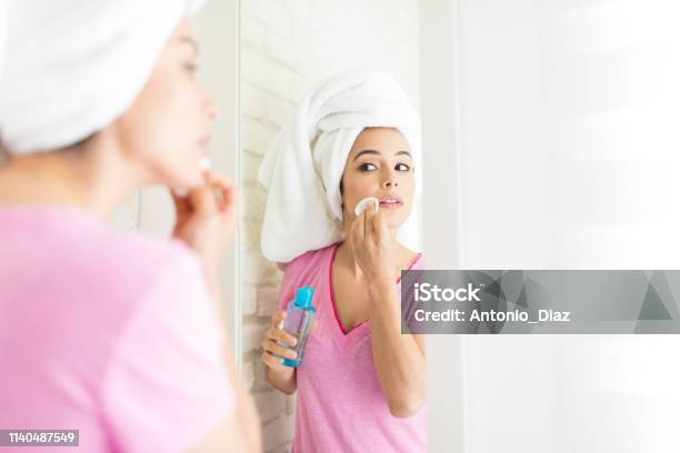 Keeping Her Skin Perfect Stock Photo - Download Image Now - Cotton Pad, One Woman Only, Women