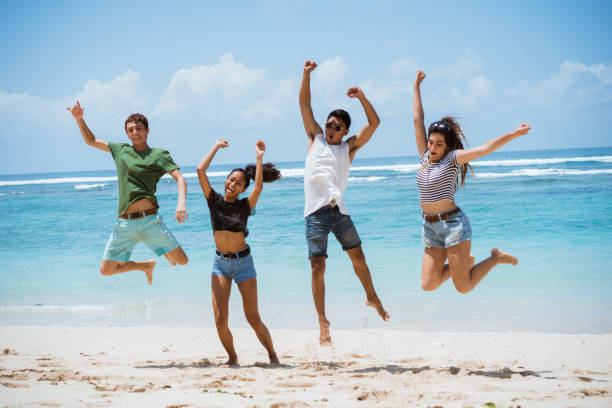 istock jump to the air together pose 1140488348