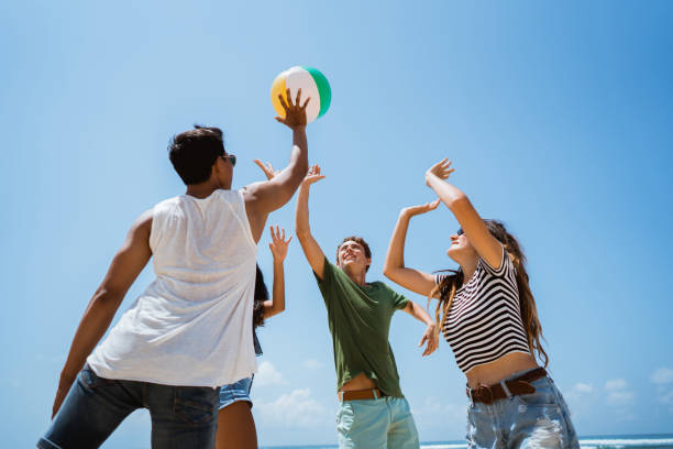 istock young people playing with volley ball 1140488596