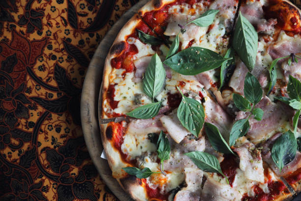 istock Pizza with ham bacon and vegetable , italian food 1140490625