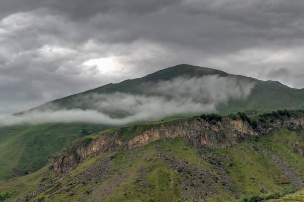 Hilly landscape near the village of Gergeti in Georgia, under Mount Kazbegi.