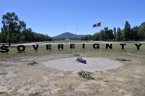 Canberra, Australia - February 22, 2019: Sovereignty sign at the Aboriginal Tent Embassy in Canberra Parliamentary Zone Australia Capital Territory. It represent the political rights of Aboriginal Australians.