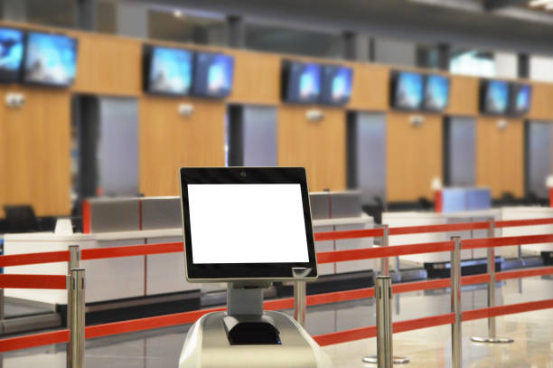 airport online self check-in kiosk (screen has clipping path) - airport airport check in counter ticket ticket machine imagens e fotografias de stock