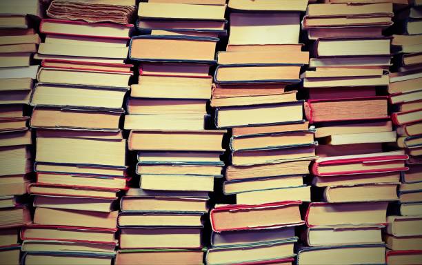 istock books with lots of pages with vintage toned effect 1140499652