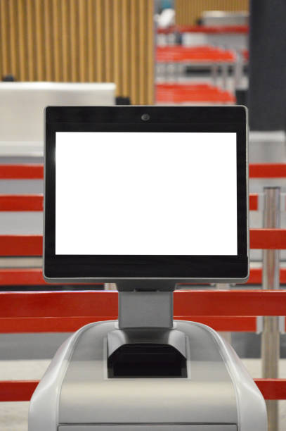 airport online self check-in kiosk (screen has clipping path) - airport airport check in counter arrival departure board checkout counter imagens e fotografias de stock