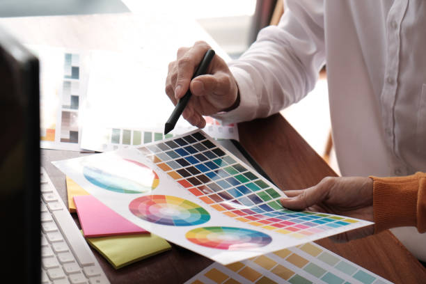 istock Graphic designer working on digital tablet. artist drawing on graphic tablet and Color swatch samples. 1140510582