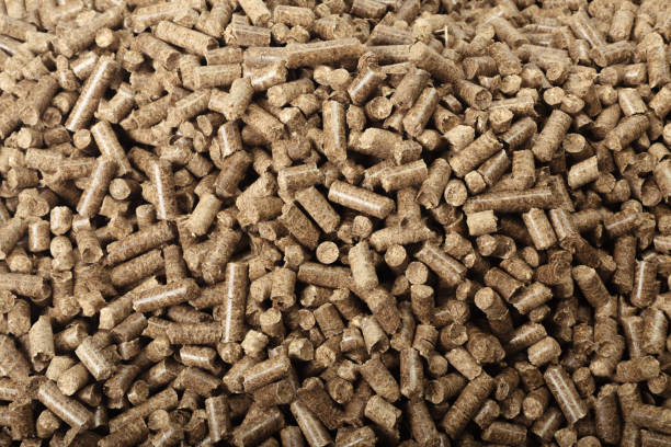 istock Wood pellets in the background. 1140513707