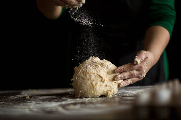 istock Kneading Loaf of Bread with Hands 1140515069