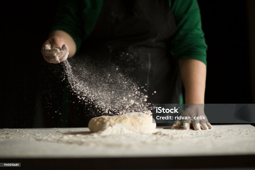 Kneading Loaf of Bread with Hands Dough Stock Photo