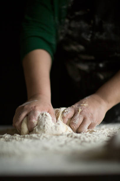 istock Kneading Loaf of Bread with Hands 1140515814