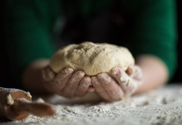 istock Kneading Loaf of Bread with Hands 1140515969