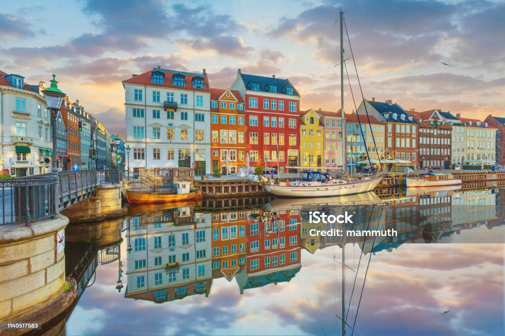 Nyhavn, Copenhagen, Denmark Sunset at the harbour Copenhagen Stock Photo