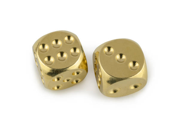 istock Two golden dices closeup isolated on white background. Six and three, with a shadow. 1140523824