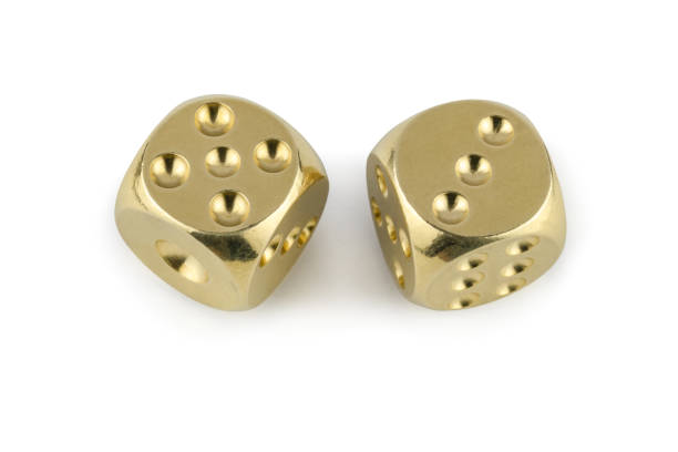 istock Two golden dices closeup isolated on white background. Five and three, with a shadow. 1140523874