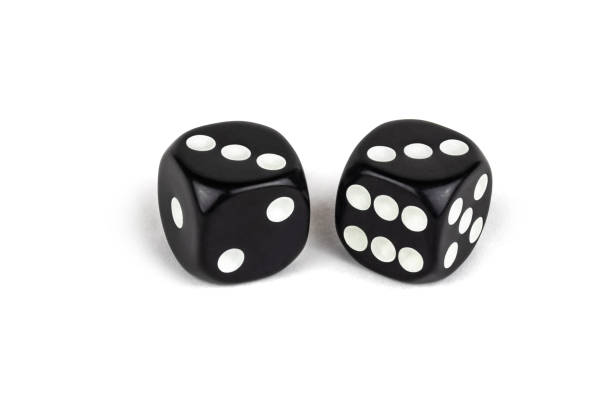 istock Two black dice isolated on a white background. Three and three. 1140523956