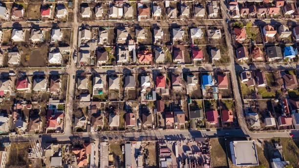 istock Aerial drone flight over a suburban community 1140524723