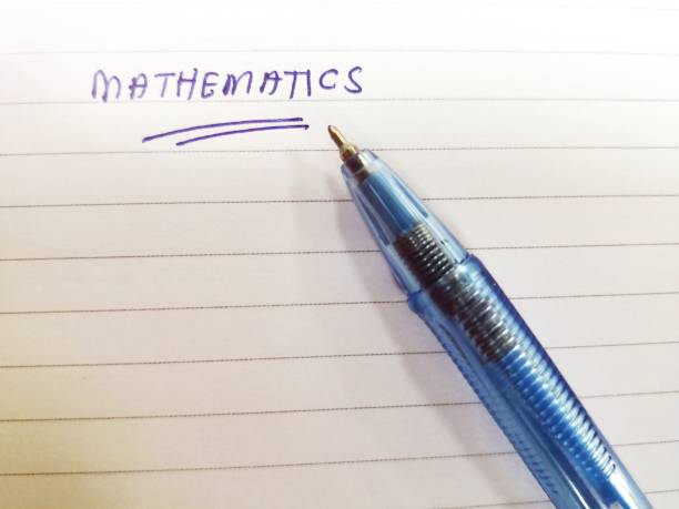 the word "mathematics" writte  on paper - writte imagens e fotografias de stock