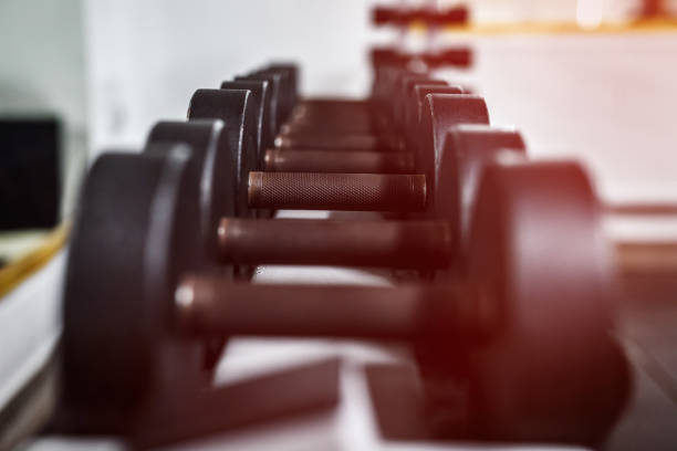 istock Different sport equipment in gym as background 1140526771