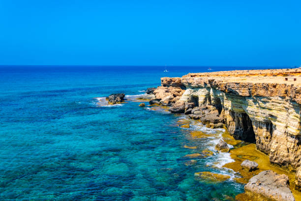 istock Sea caves at cap greco in the south-eastern cyprus 1140527414