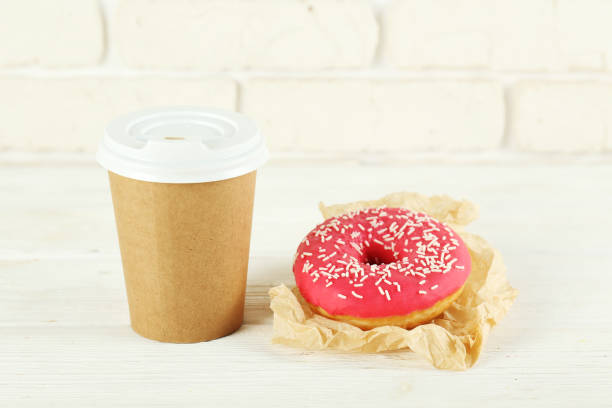 istock Minimal composition in vibrant colors with bright glaze donuts. 1140528376